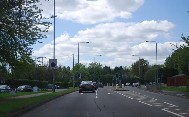 The A21 Farnborough Way at Farnborough, a dual carriageway with traffic lights and trees